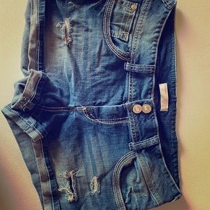 Denim shorts with beaded butterflies on pockets
